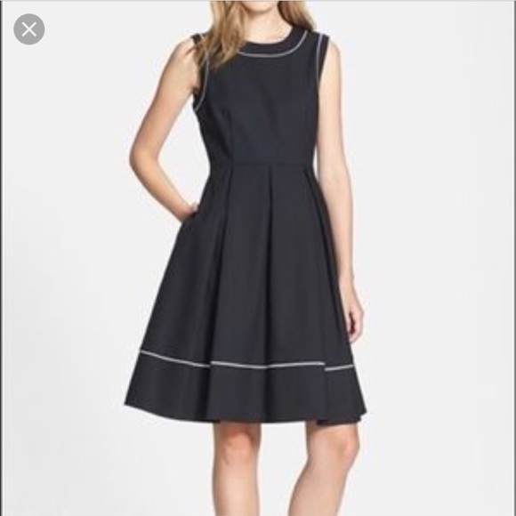 black dress with white piping